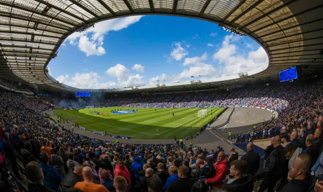 A sun-drenched Hampden is packed to capacity