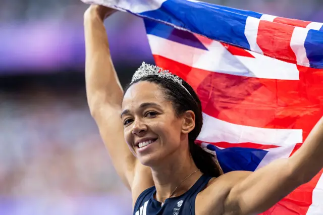 Katarina Johnson-Thompson celebrates after winning heptathlon silver at the Paris Olympics