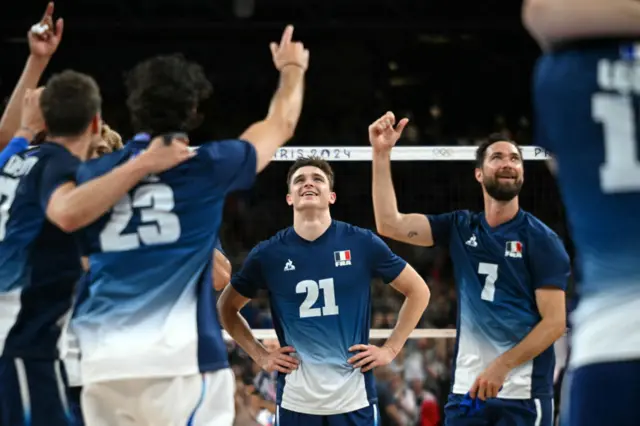 France's #21 Theo Faure and teammates celebrate