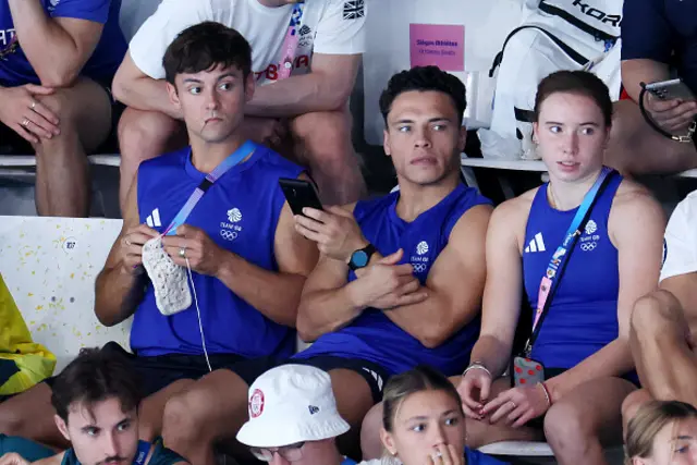 Thomas Daley of Team Great Britain is seen knitting whilst sat in attendance