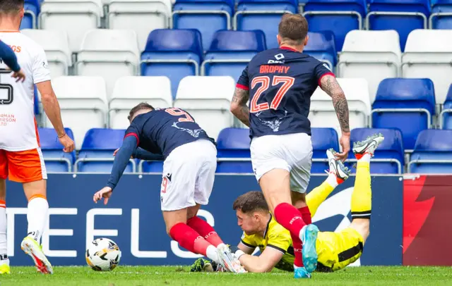 Ronan Hale is fouled by Jack Walton for County's penalty