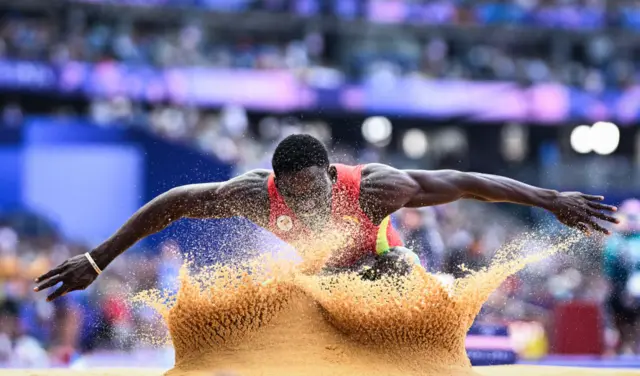 Grenada's Lindon Victor competes in the men's decathlon long jump of the athletics event at the Paris 2024 Olympic Games at Stade de France in Saint-Denis