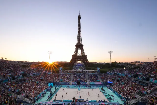 A general view of the Eiffel tower at sunset during a Women's Round of 16 match between Teams Brazil and Japan on day ten of the Olympic Games Paris