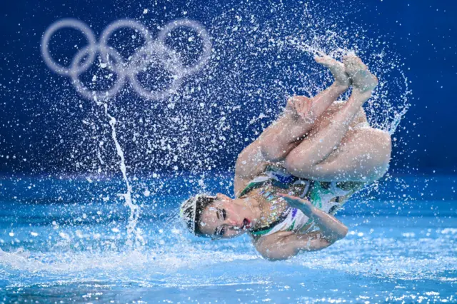 Japan's Moe Higa and Japan's Tomoka Sato compete in the duet free routine of the artistic swimming event during the Paris 2024 Olympic Games at the Aquatics Centre