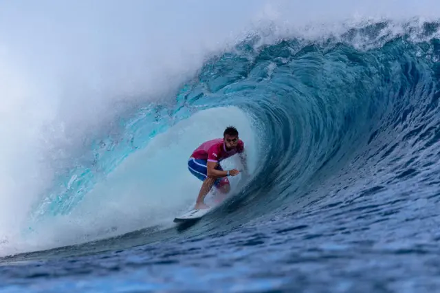 Kauli Vaast of Team France rides a wave during round two of surfing on day two of the Olympic Games Paris 2024 on July 28, 2024 in Teahupo'o, French Polynesia