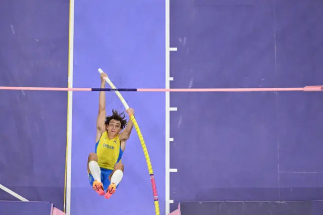 Sweden's Armand Duplantis competes to pass 6.25m and set the new world record in the men's pole vault final of the athletics event at the Paris 2024 Olympic Games at Stade de France in Saint-Denis