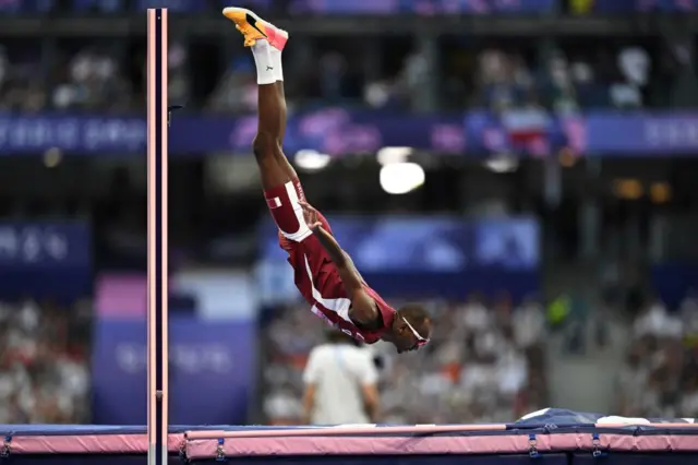 Qatar's Mutaz Essa Barshim competes in the men's high jump final of the athletics event at the Paris 2024 Olympic Games at Stade de France in Saint-Denis