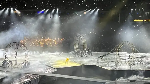 Performers take to the stage during the Olympic closing ceremony