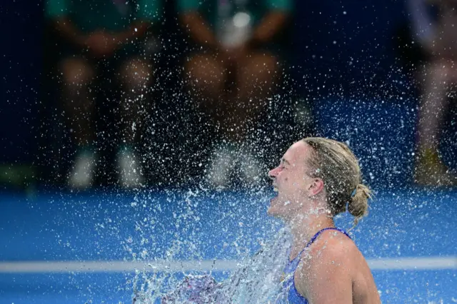 weden's Sarah Sjoestroem celebrates after winning the final of the women's 100m freestyle swimming event during the Paris 2024 Olympic Games at the Paris La Defense Arena