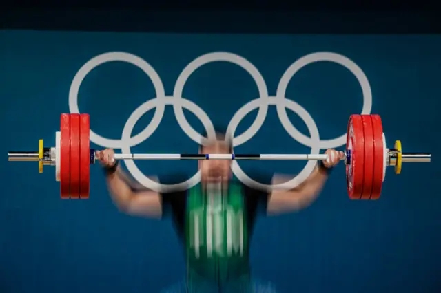 Turkmenistan's Davranbek Hasanbayev competes in the men's -102kg weightlifting event during the Paris 2024 Olympic Games at the South Paris Arena