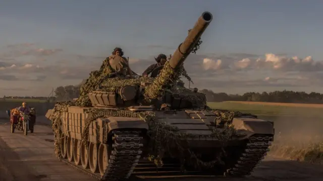 Ukrainian servicemen operate a Soviet-made T-72 tank in the Sumy region, near the border with Russia, on August 12, 2024, amid the Russian invasion of Ukraine.