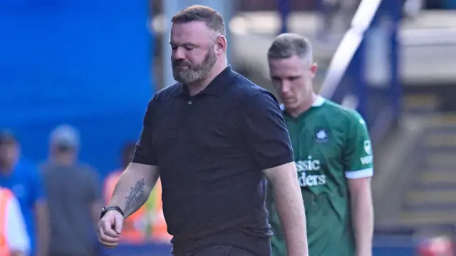 Wayne Rooney walks off dejected after Plymouth Argyle's 4-0 defeat against Sheffield Wednesday