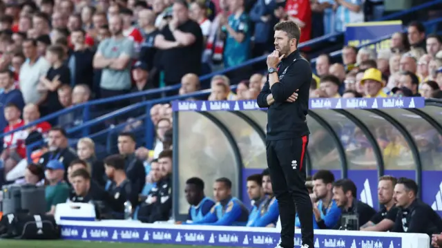 Michael Carrick on the touchline