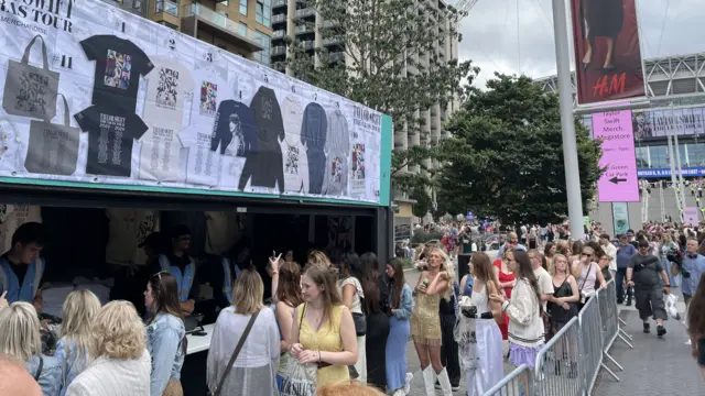 Queue of people outside a merchandise store in Wembley near Taylor Swift gig