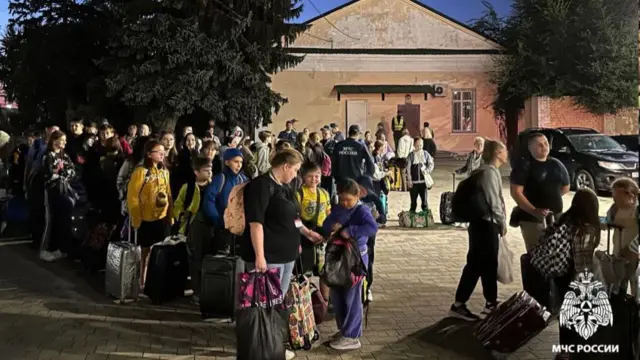 Russian citizens arrive at a railway station to travel to temporary accommodation centres in Nevinnomyssk, Mineralnye Vody and Shpakovsky municipalities