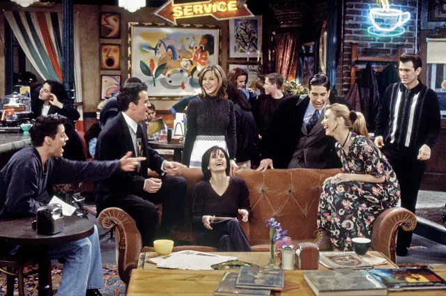 Pictured: (clockwise from left) Matt LeBlanc as Joey Tribbiani, Matthew Perry as Chandler Bing, Jennifer Aniston as Rachel Green, David Schwimmer as Ross Geller, Chris Isaak as Rob Donnen, Lisa Kudrow as Phoebe Buffay, Courteney Cox Arquette as Monica Geller