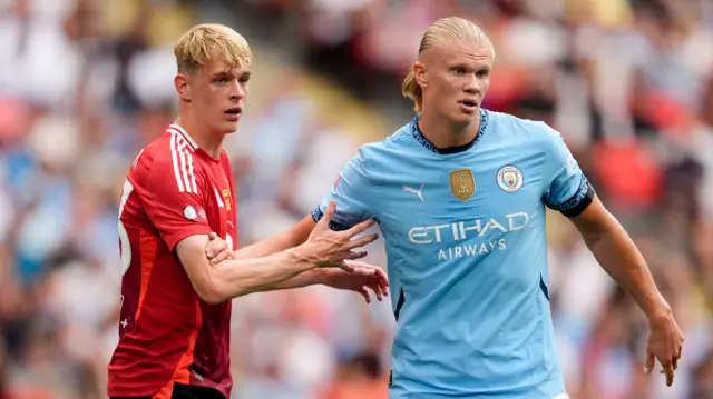Toby Collyer and Erling Haaland during the 2024 Community Shield