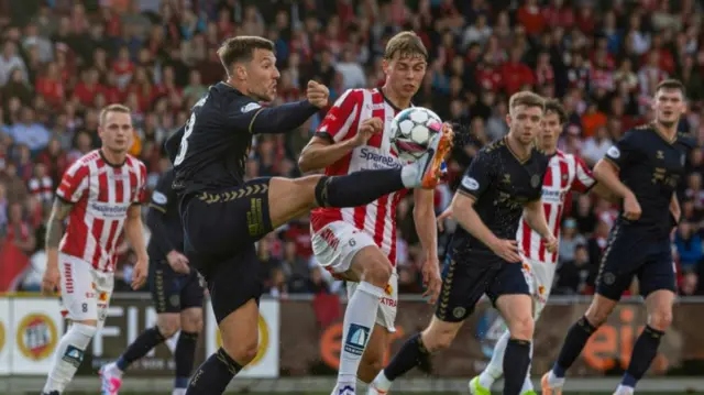 Kilmarnock's Brad Lyons and Tromso's Jens Hjerto-Dahl in action during a UEFA Conference League qualifying match between Tromso and Kilmarnock at the Romssa Arena, on August 15, 2024, in Tromso, Norway. (Photo by Craig Foy / SNS Group)