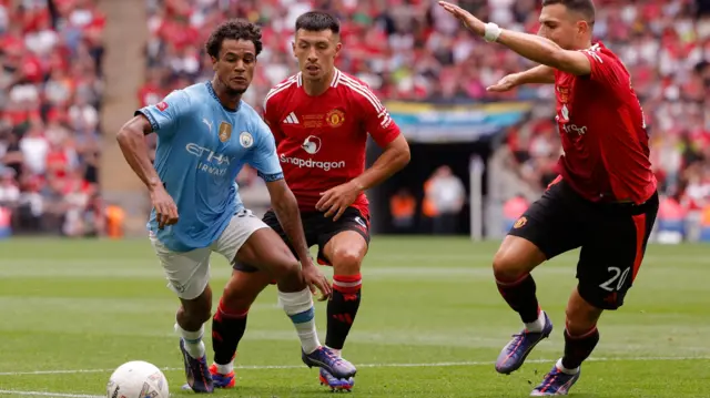 Oscar Bobb playing in the 2024 Community Shield