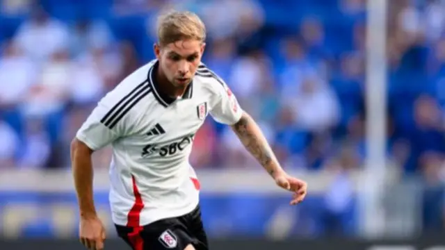 Emile Smith Rowe running with the ball while playing for Fulham