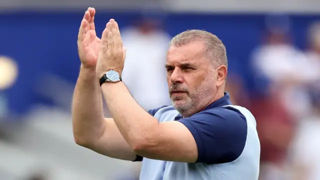 Ange Postecoglou applauds the Tottenham fans