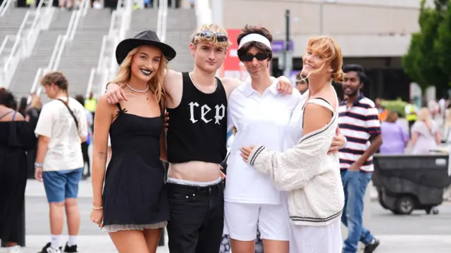 Kiki Heath, 24, Bailey Heath, 23, Indi Heath, 36 and China Heath, 26 pose for a photo outside Wembley Stadium in London