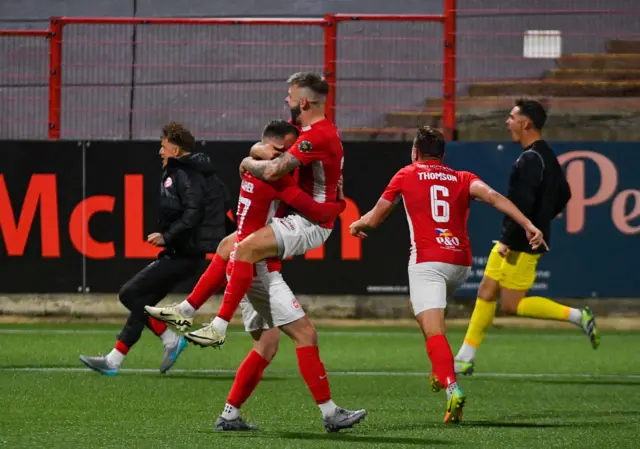 Celebration time for Larne after winning the shootout