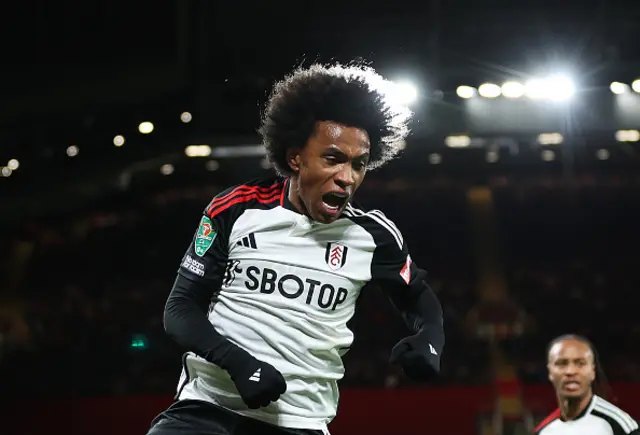 Willian of Fulham celebrates