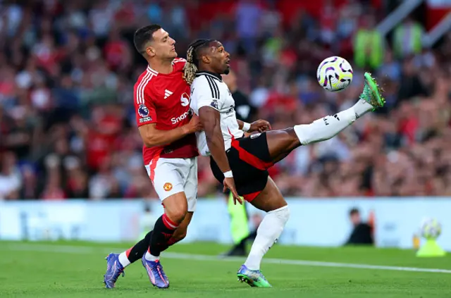 Diogo Dalot of Manchester United battles for possession with Adama Traore