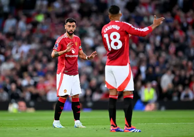 Bruno Fernandes of Manchester United gestures towards Casemiro