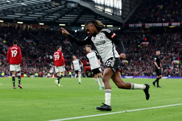 Alex Iwobi celebrates