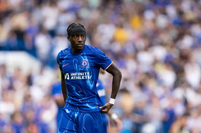 Noni Madueke in a Chelsea kit