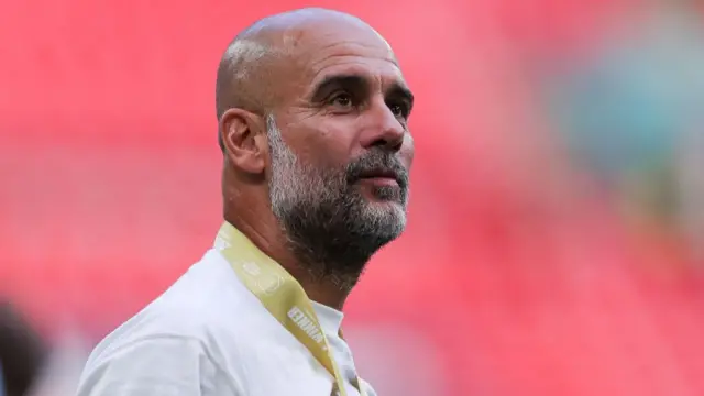 'Pep' Guardiola, manager of Manchester City, celebrates after the 2024 FA Community Shield match between Manchester United and Manchester City at Wembley Stadium on August 10, 2024 in London, England.