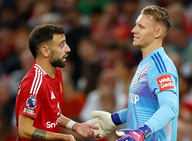 Manchester United's Bruno Fernandes and Fulham's Bernd Leno