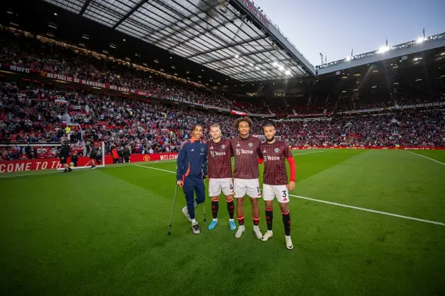 New signings Leny Yoro, Matthijs de Ligt, Joshua Zirkzee & Noussair Mazaroui of Manchester United pose