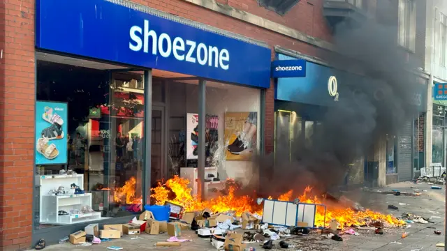 A fire outside a shop in Hull during the unrest earlier this month