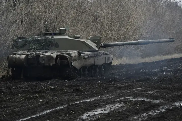 Challenger 2 tank on a muddy battlefield