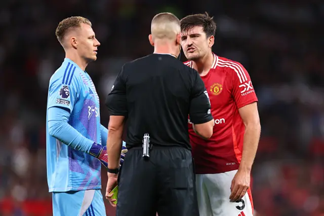 Harry Maguire of Manchester United receives a yellow card