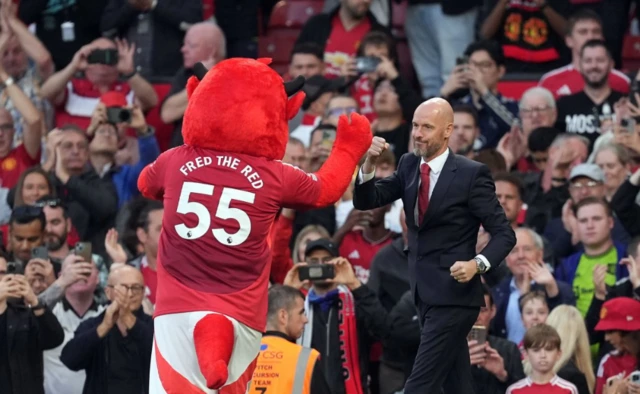 Manchester United manager Erik ten Hag with mascot Fred the Red