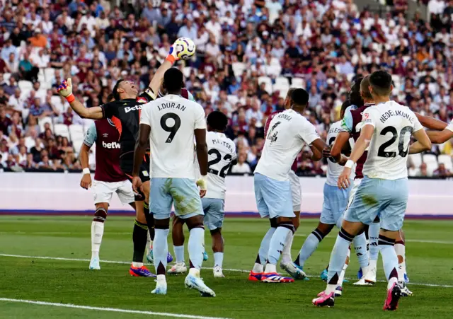 Martinez flaps at a corner ball as it comes into the box