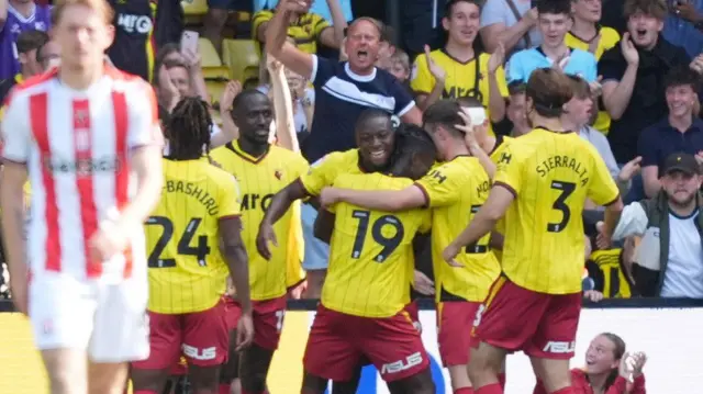 Watford players celebrate a goal