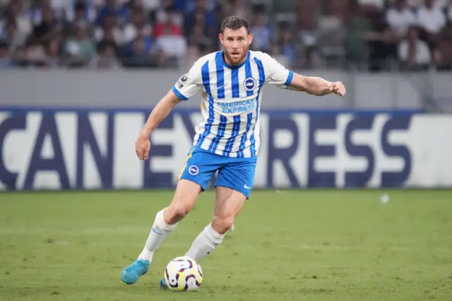 James Milner shapes to dribble the ball