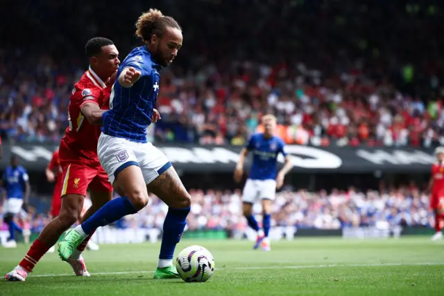 Ipswich Town's Irish midfielder #11 Marcus Harness (2nd L) controls the ball during the English Premier League football match between Ipswich Town and Liverpool at Portman Road in Ipswich