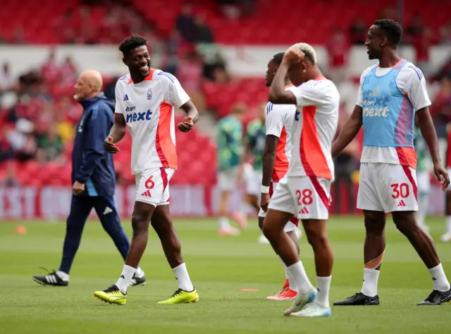 Forest players smile during the warm up