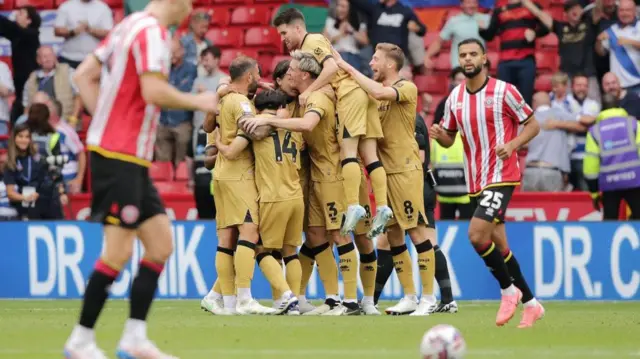 QPR players celebrate