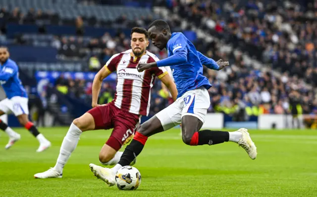 Rangers' Mohamed Diomande is closed down by St Johnstone's Jack Sanders early in the match