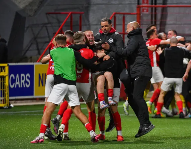 Tiernan Lynch and Larne celebrate