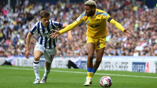 Tom Fellows of West Brom and Jayden Bogle of Leeds United