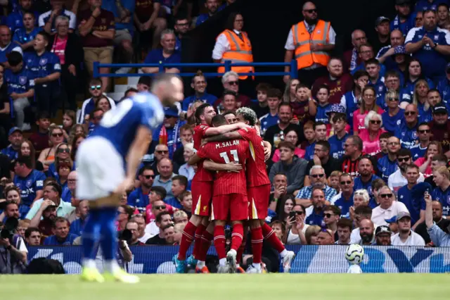 Liverpool celebrate as Chaplin stands on his haunches