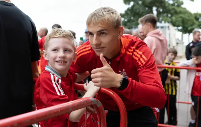 Aberdeen winger Topi Keskinen with a fan